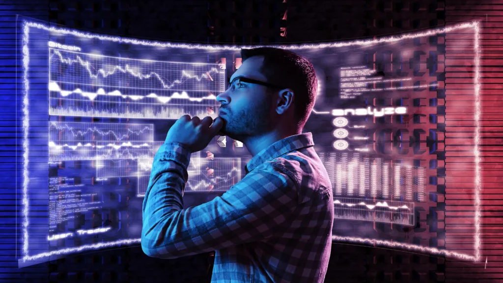 Eine Person mit Brille steht in Denkerpose, die Hand am Kinn, vor einem großen, digitalen Display. Dieses scheint die Denkprozesse der Person anzuzeigen.